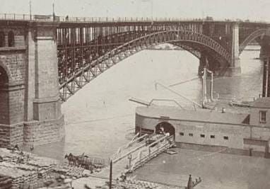 The Eads Bridge, a historic steel arch bridge that spans the Mississippi River, connecting St. Louis, Missouri, and East St. Louis, Illinois.