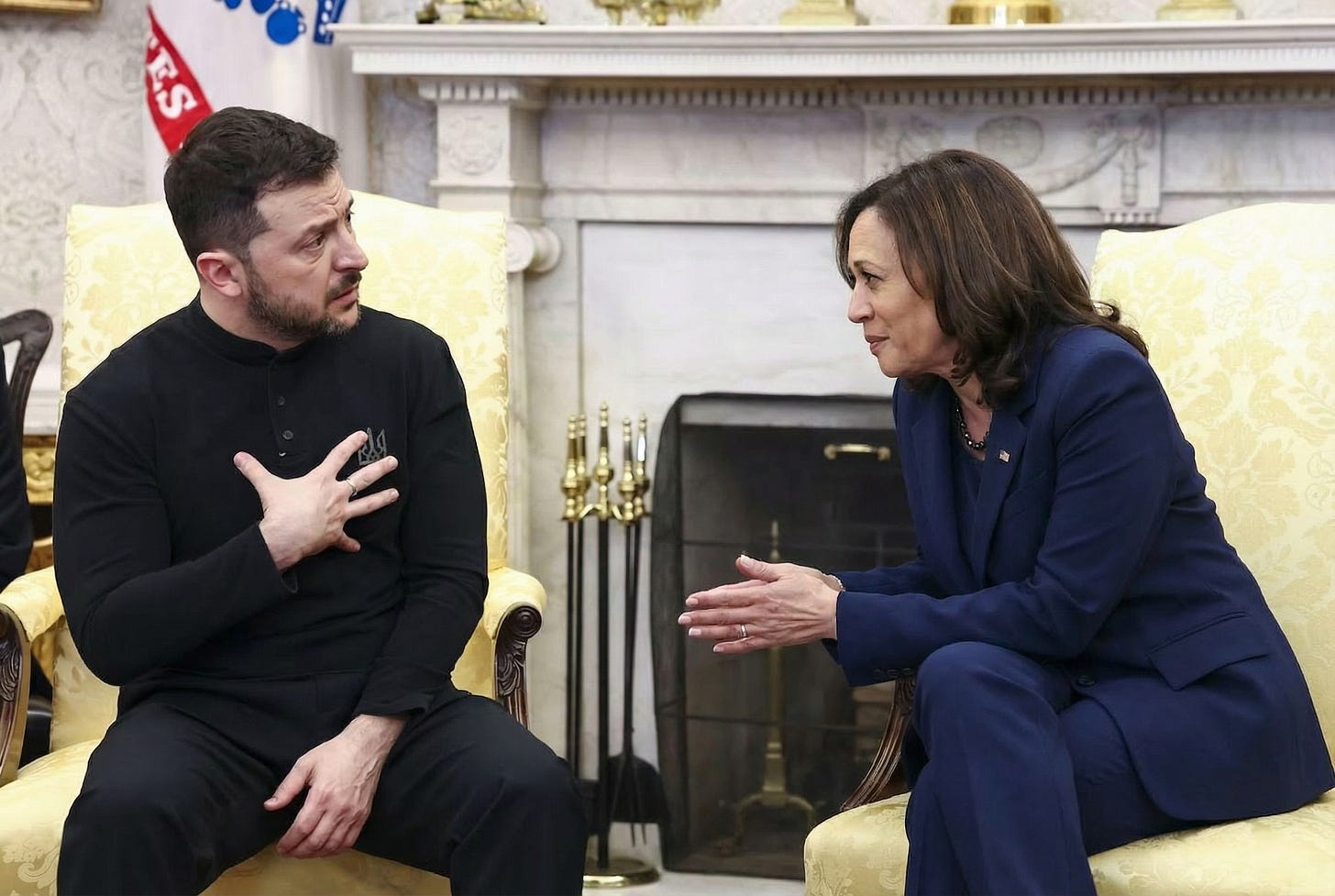 Volodymyr Zelenskyy sitting in the Oval Office looking tense as President Kamala Harris speaks to him Volodymyr Zelenskyy sitting in the Oval Office looking tense as President Kamala Harris speaks to him