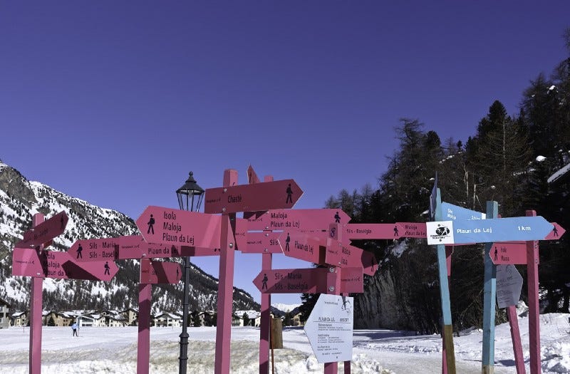 Many signs confusing where to go Many signs confusing where to go