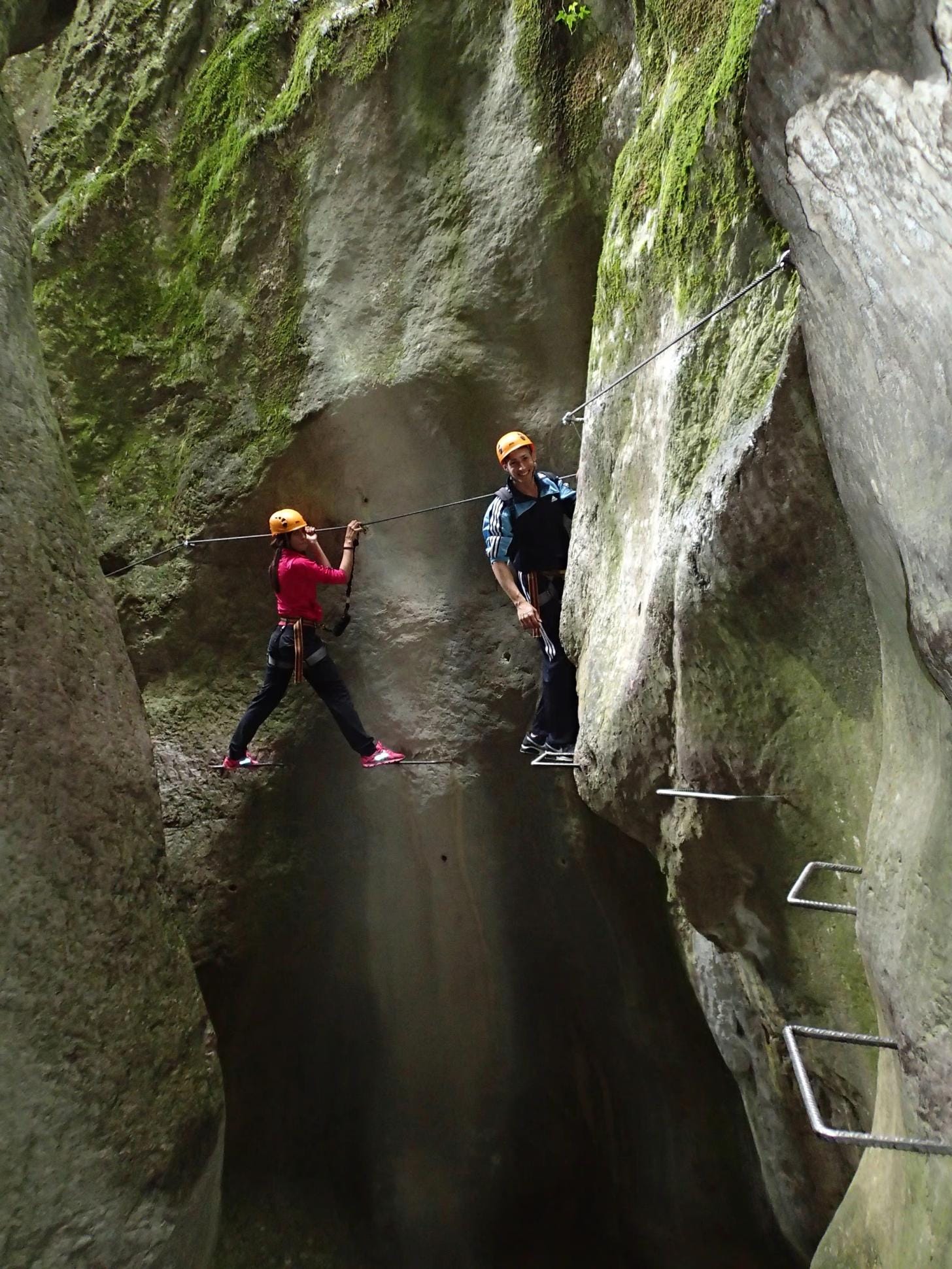 A group of climbers scaling in Arco, Italy, one of Europe's most renowned climbing destinations. A group of climbers scaling in Arco, Italy, one of Europe's most renowned climbing destinations.