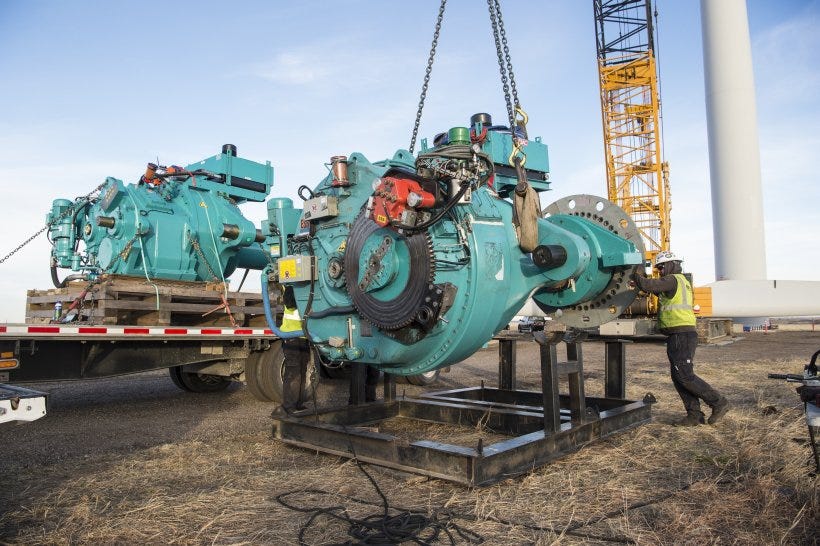 NREL researchers replacing an existing gearbox with a fully instrumented Winergy gearbox and SKF main bearing in the DOE-owned GE 1.5-megawatt wind turbine at NREL’s Flatirons Campus. NREL researchers replacing an existing gearbox with a fully instrumented Winergy gearbox and SKF main bearing in the DOE-owned GE 1.5-megawatt wind turbine at NREL’s Flatirons Campus.