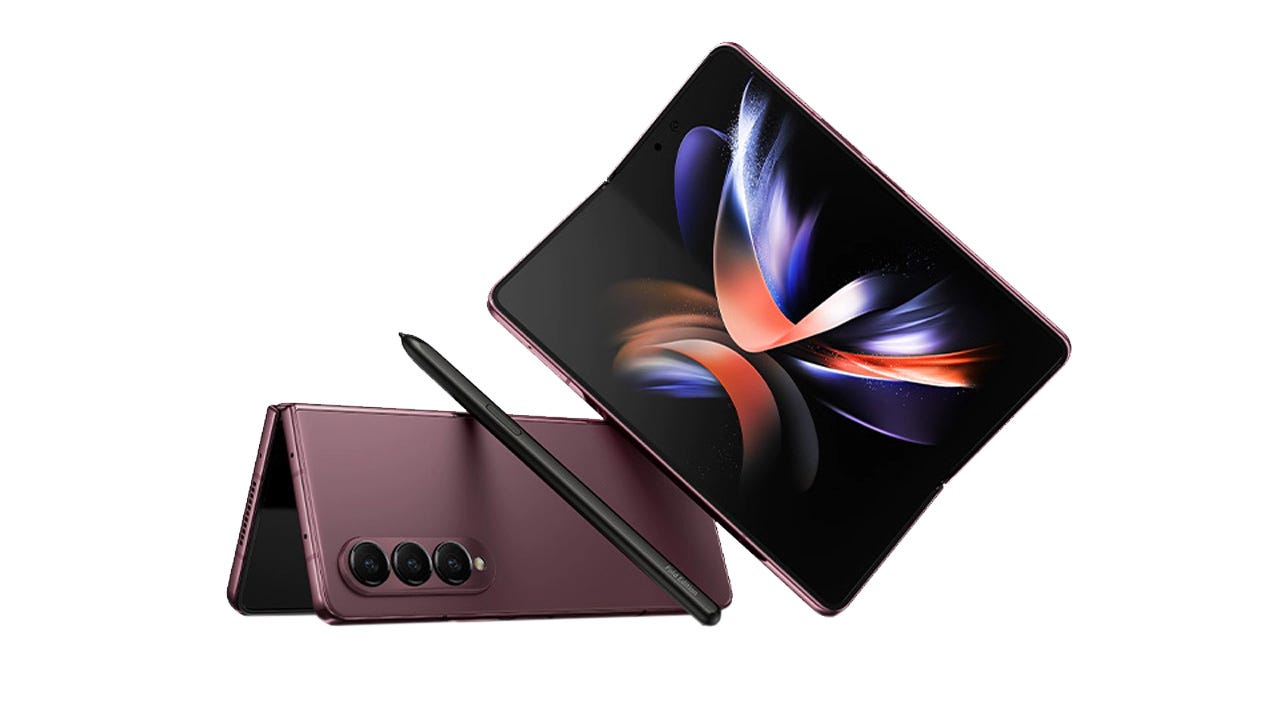 Two Z Fold 4s, one open most of the way and the other partially open and standing, tentlike, on its two edges. An S Pen leans on one.