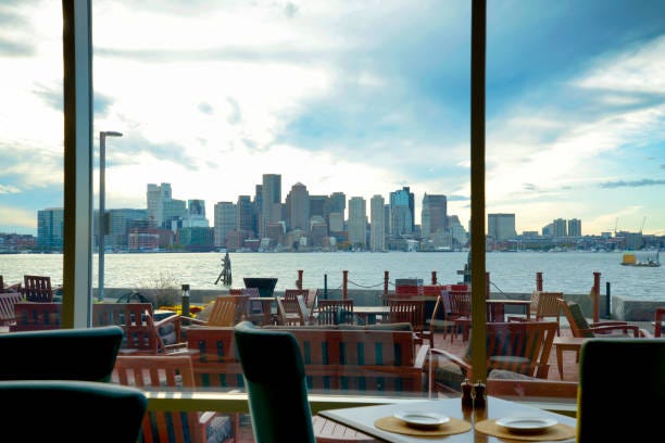 Boston skyline from airport lounge  airport lounge boston stock pictures, royalty-free photos & images