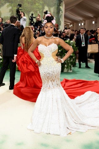 Image may contain Taraji P. Henson Fashion Clothing Footwear Shoe Dress Accessories Bag Handbag and Jewelry