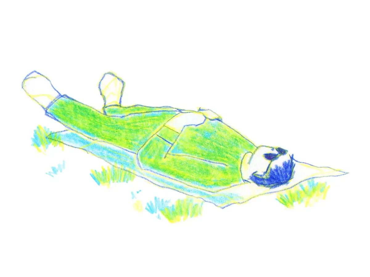 Sketch of a person lying on bright green grass in a park