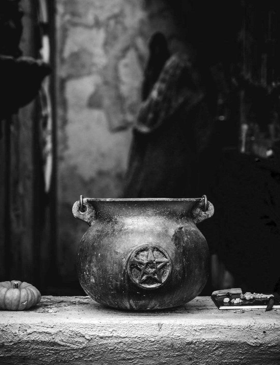 a vase with a face painted on it a vase with a face painted on it