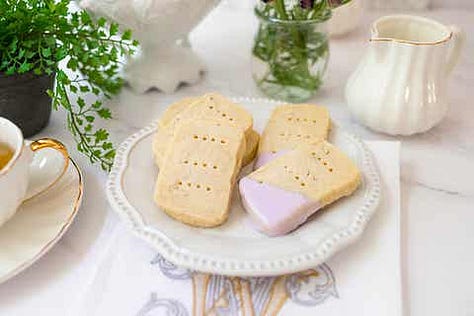 Blueberry bread, lavender shortbread, July dinners, tomato pie, a peach crumb bar and a table setting idea for July.