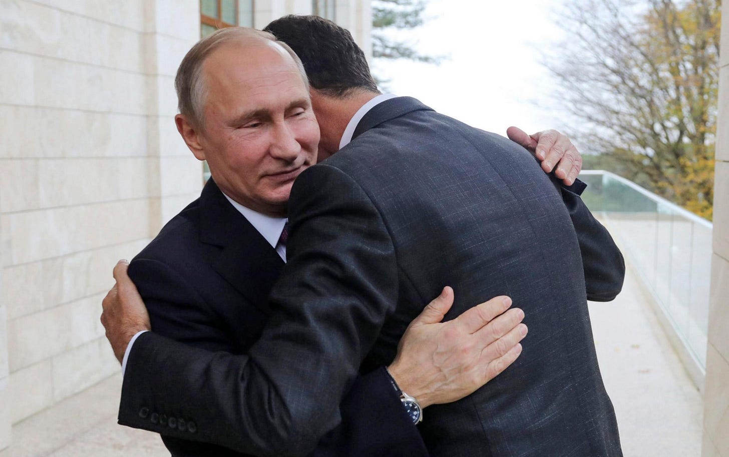 Vladimir Putin, pictured embracing Assad in November 2017, reportedly has no intention of meeting with him in Russia