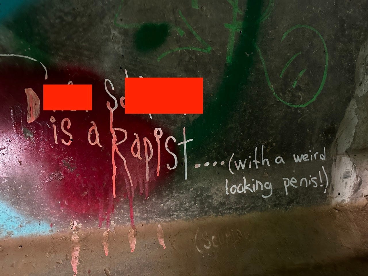 A close-up of a wall with writing
Description automatically generated A close-up of a wall with writing
Description automatically generated