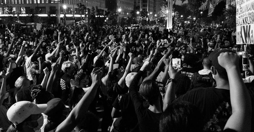 grayscale photo of people on street