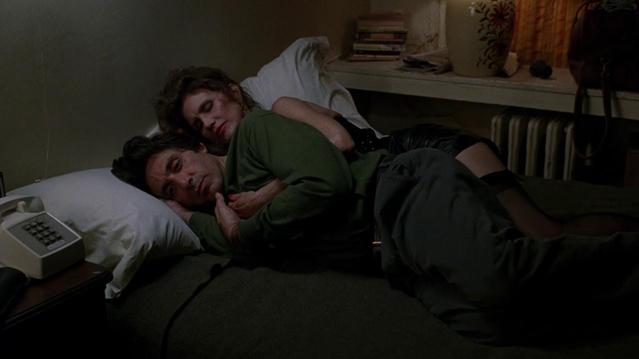 Al Pacino and Shannon Wilcox spoon in bed by a telephone in "Frankie and Johnny" (1991)