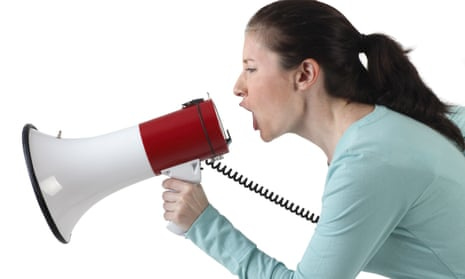 Woman shouting into megaphone
