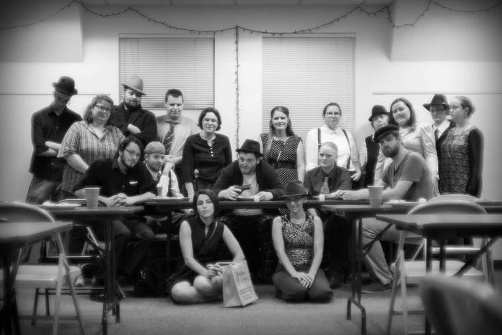 5 Pictures. 1) A group of people taking a selfie with a masked figure. 2) a group photo of people in alien costumes holding grocery bags. 3) Folks in pulpy "ancient egypt" costumes with a mummy chasing them. 4) a group of people in agressively christmasy outfits around a tree. 5) Black and white photo of a group dressed as mobsters.