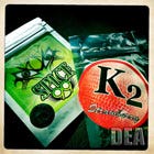 Foile wrapped packages of Spice with brightly colored labels of neon green or red with the label K2. Foile wrapped packages of Spice with brightly colored labels of neon green or red with the label K2.
