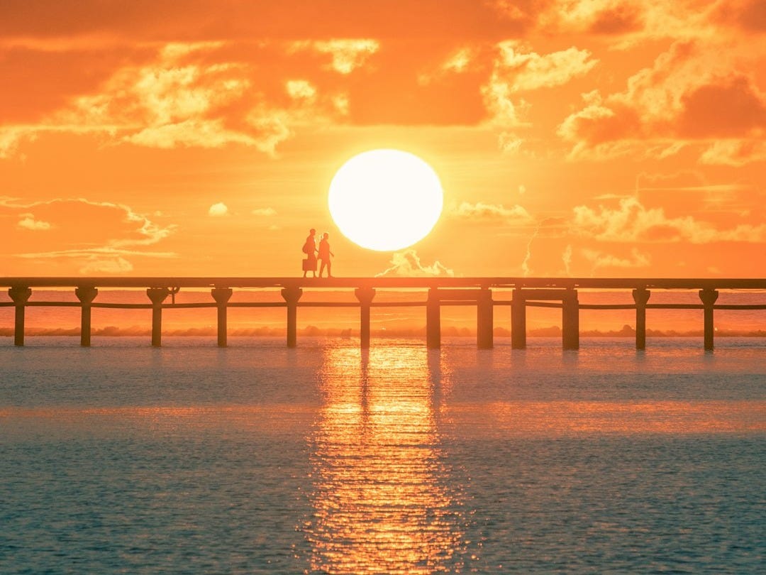 bridge over the sea during sunset bridge over the sea during sunset