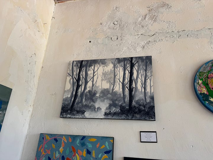 A selection of paintings and mixed media art.