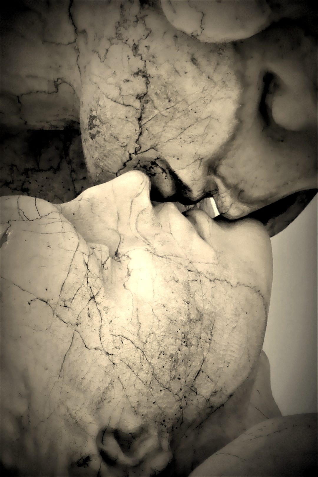 a statue of a woman with her head in her hands a statue of a woman with her head in her hands