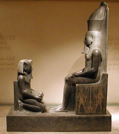 Horemheb in front of Atum, Luxor Museum, copyrigh Gerard Ducher