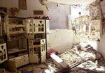 Left: A photo of an Iraqi man. Right: A photo of a destroyed house.