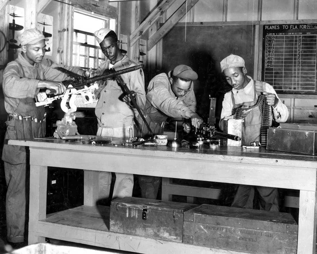 Armorers and other ground personnel undergo training at Chanute Field, Ill., during World War II.