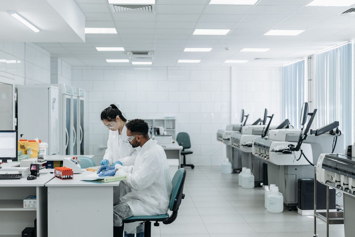 Photo by Pavel Danilyuk on Pexels Scientists in a laboratory analyzing samples with advanced equipment and protective gear. (stock photo)
