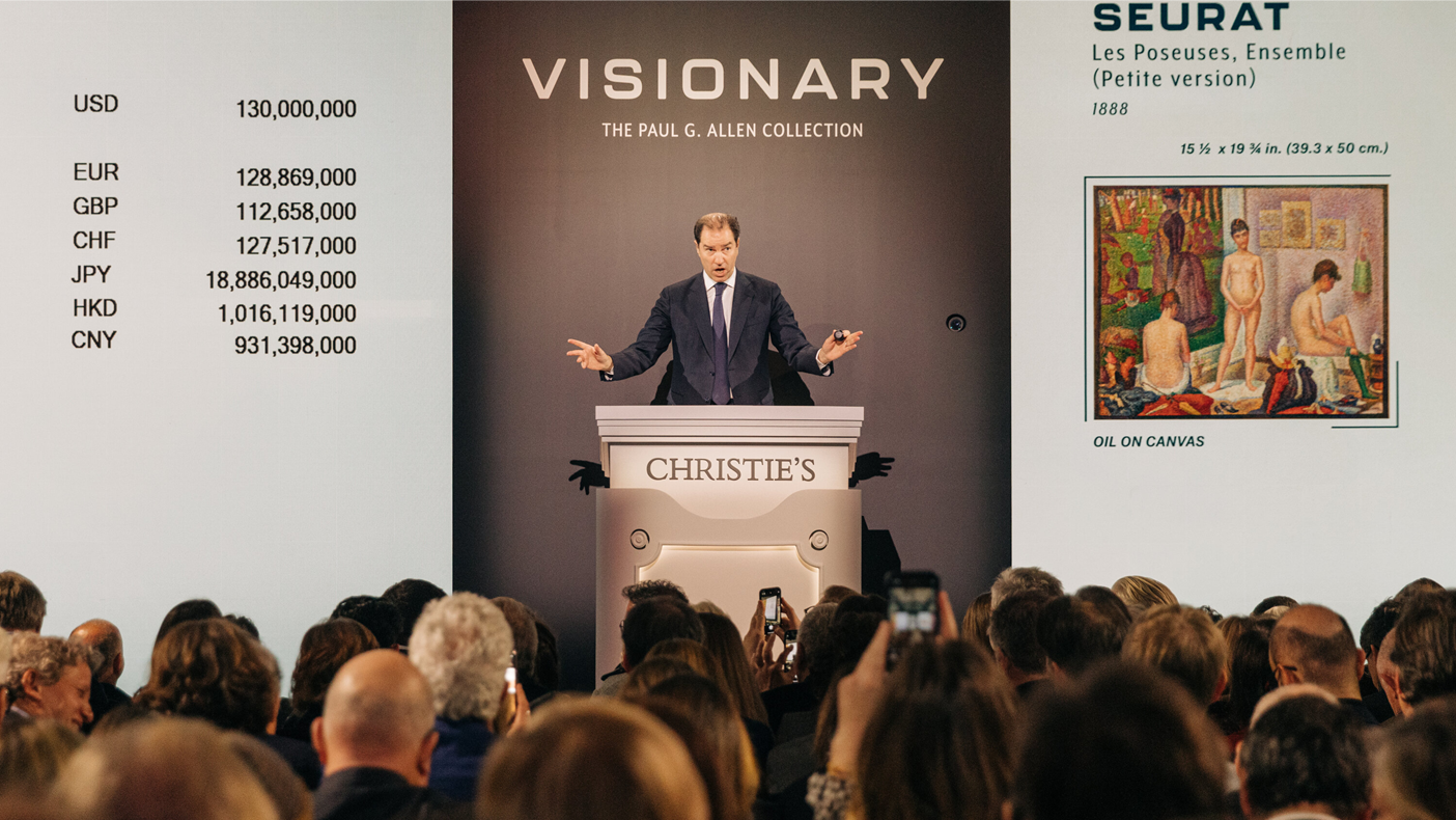 A person standing at a podium with a crowd of people watching
AI-generated content may be incorrect.