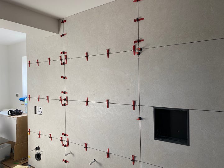 off-white tiles on the walls