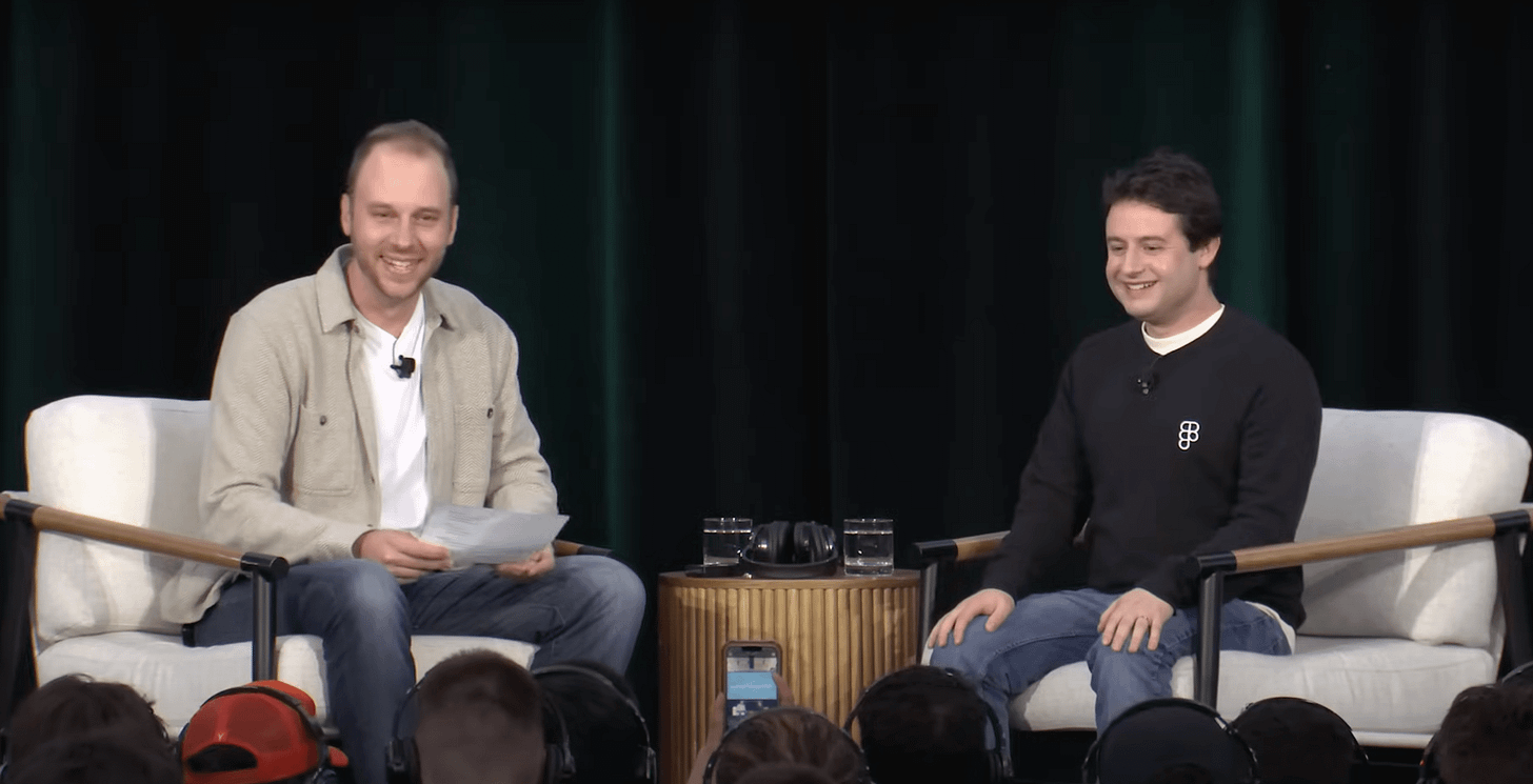 Aaron Epstein (left) and Dylan Field (right) on stage speaking to an audience Aaron Epstein (left) and Dylan Field (right) on stage speaking to an audience