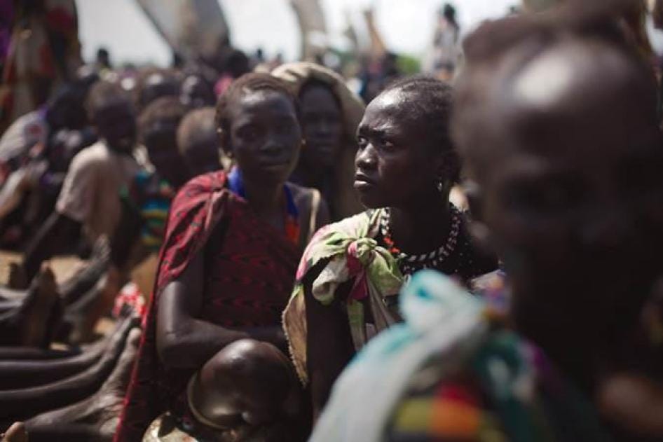 Murle women waiting for emergency food aid, Pibor town, South Sudan Murle women waiting for emergency food aid, Pibor town, South Sudan