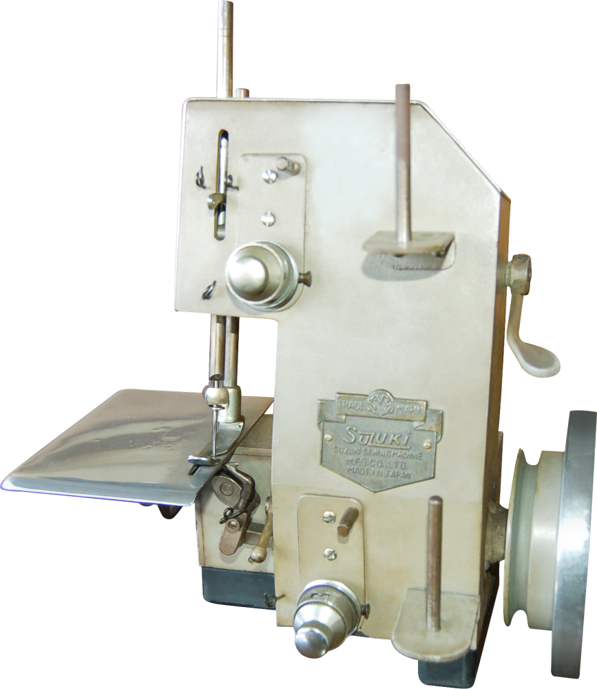 A vintage sewing machine with a metallic finish, featuring various knobs and levers, and a flat sewing surface.