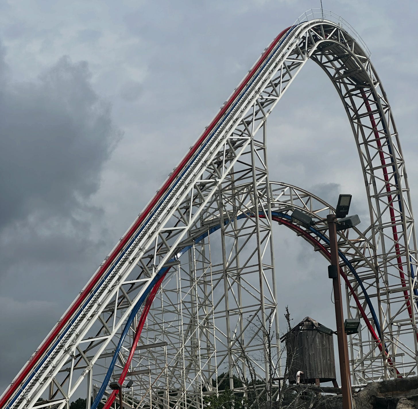 The top of a roller coaster's lift hill The top of a roller coaster's lift hill
