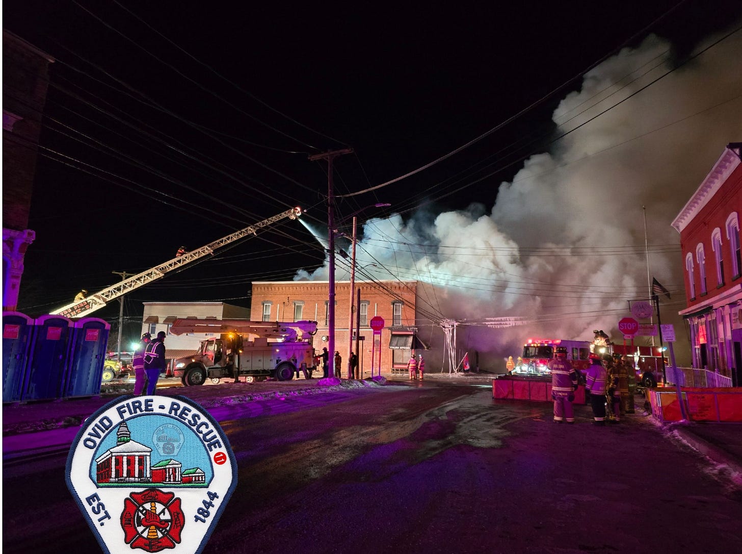 May be an image of 10 people, fire and text