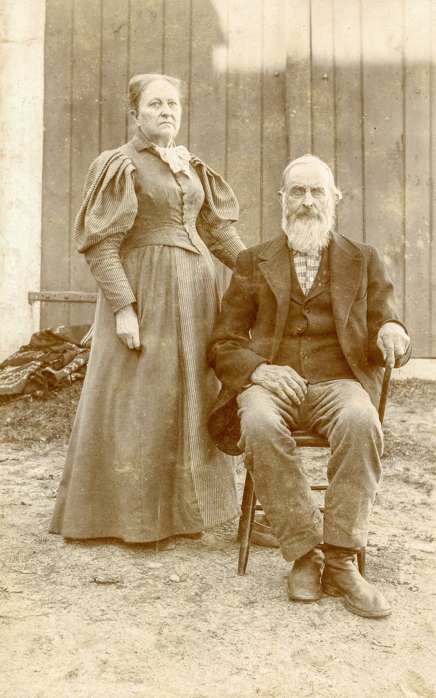 Standing woman and seated man in 1896