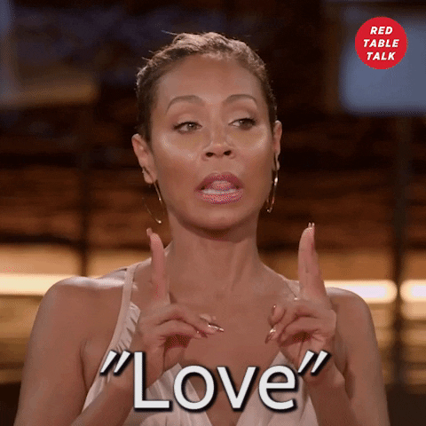 Jada Pinkett Smith saying "love" with air quotes.
