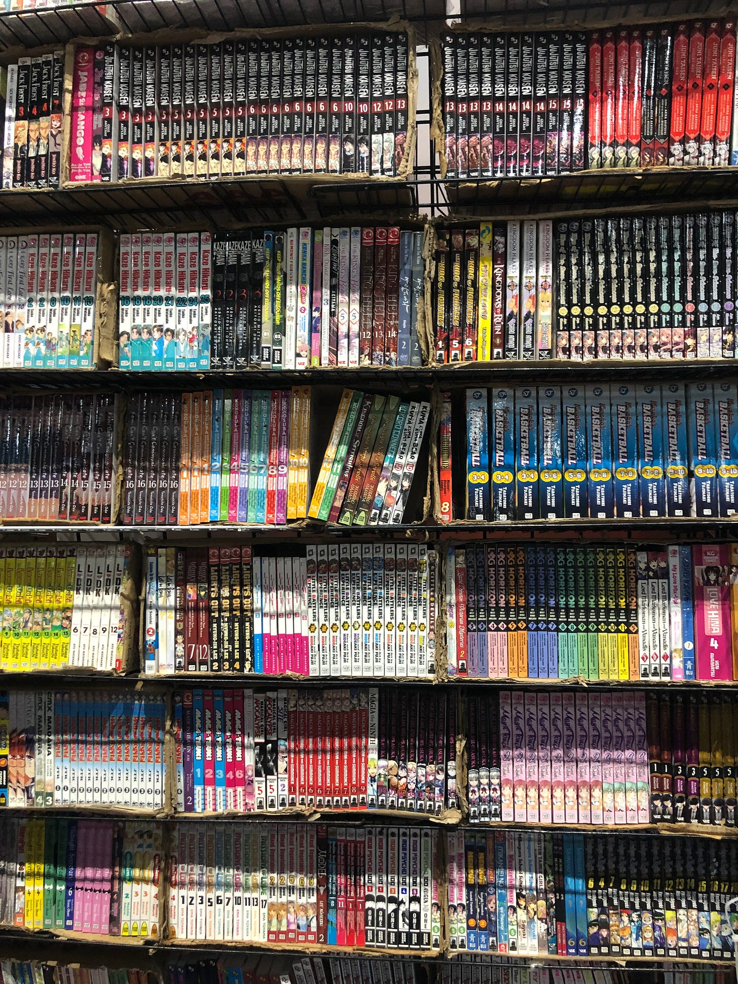 Manga stacked cover to cover.
