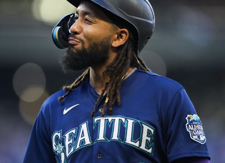 Seattle Mariners&#8217; J.P. Crawford walks back to the dugout after hitting an RBI sacrifice fly against the San Diego Padres during the third inning of a baseball game Wednesday, Aug. 9, 2023, in Seattle. (Lindsey Wasson / AP)