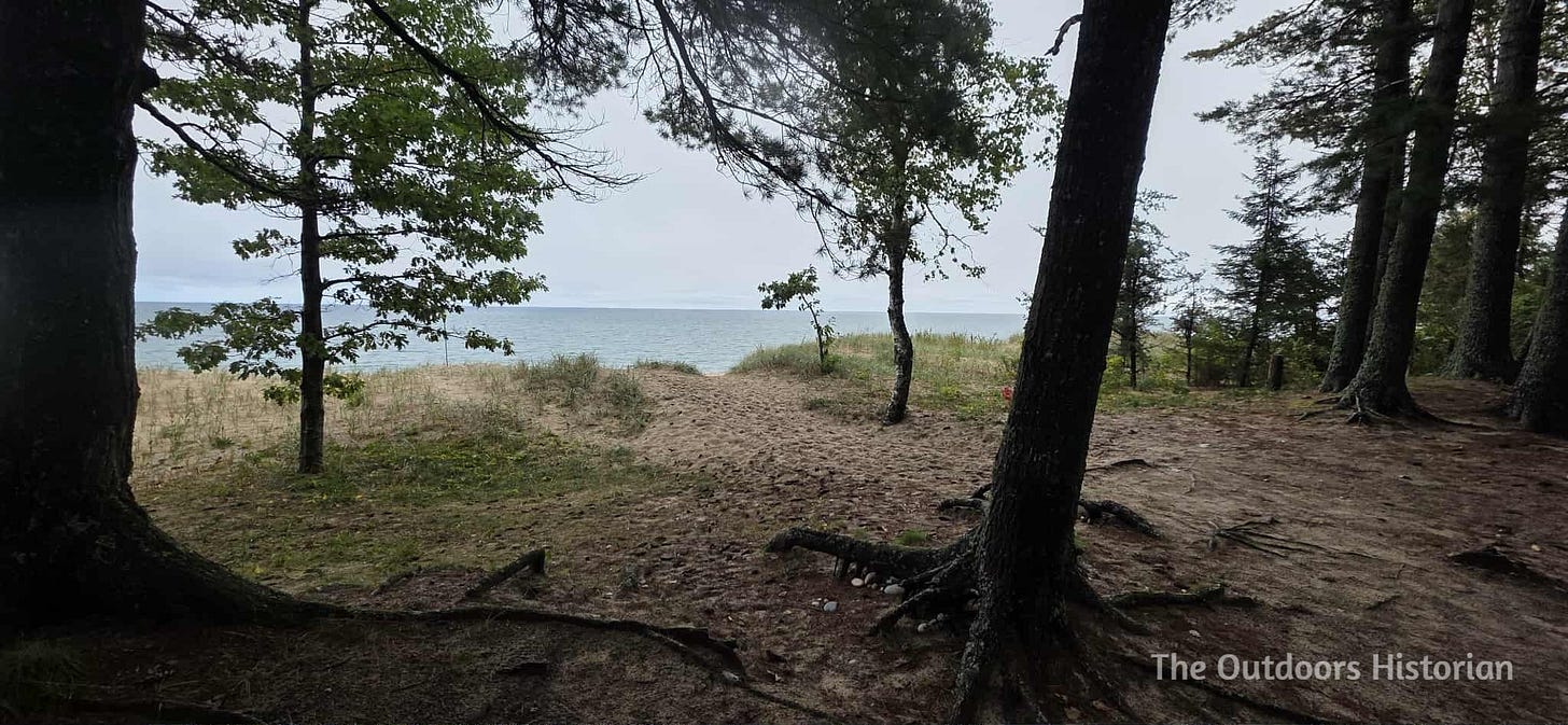 The view from the edge of a wooden sand dune overlooking Lake Superior.