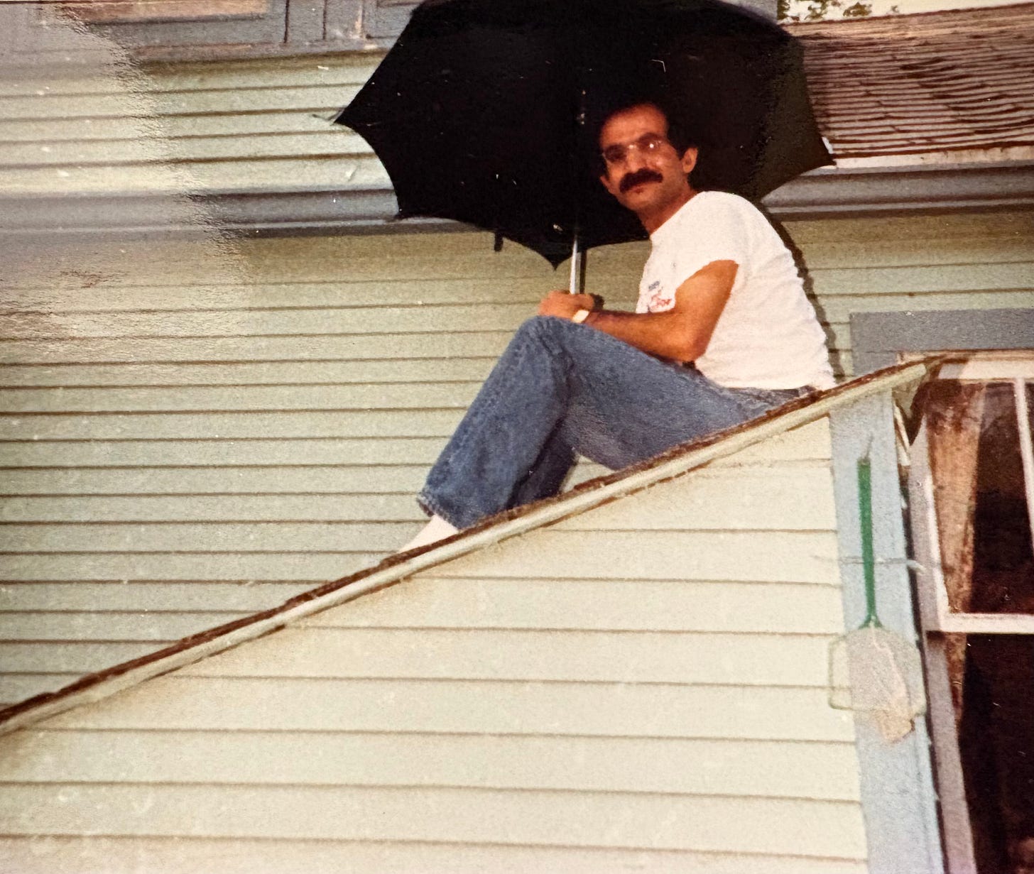 Mohsen holding an umbrella