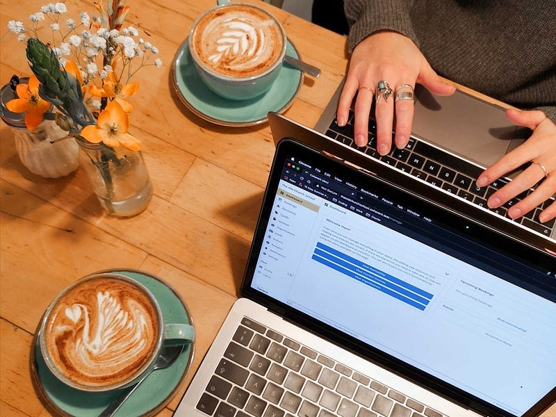 some laptops in a coffee shop some laptops in a coffee shop