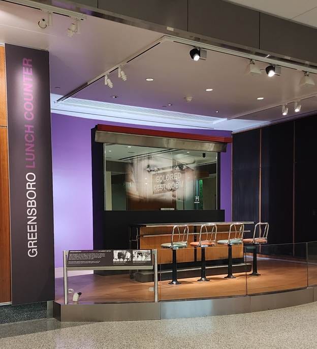 A restaurant with seats in a glass case

AI-generated content may be incorrect.