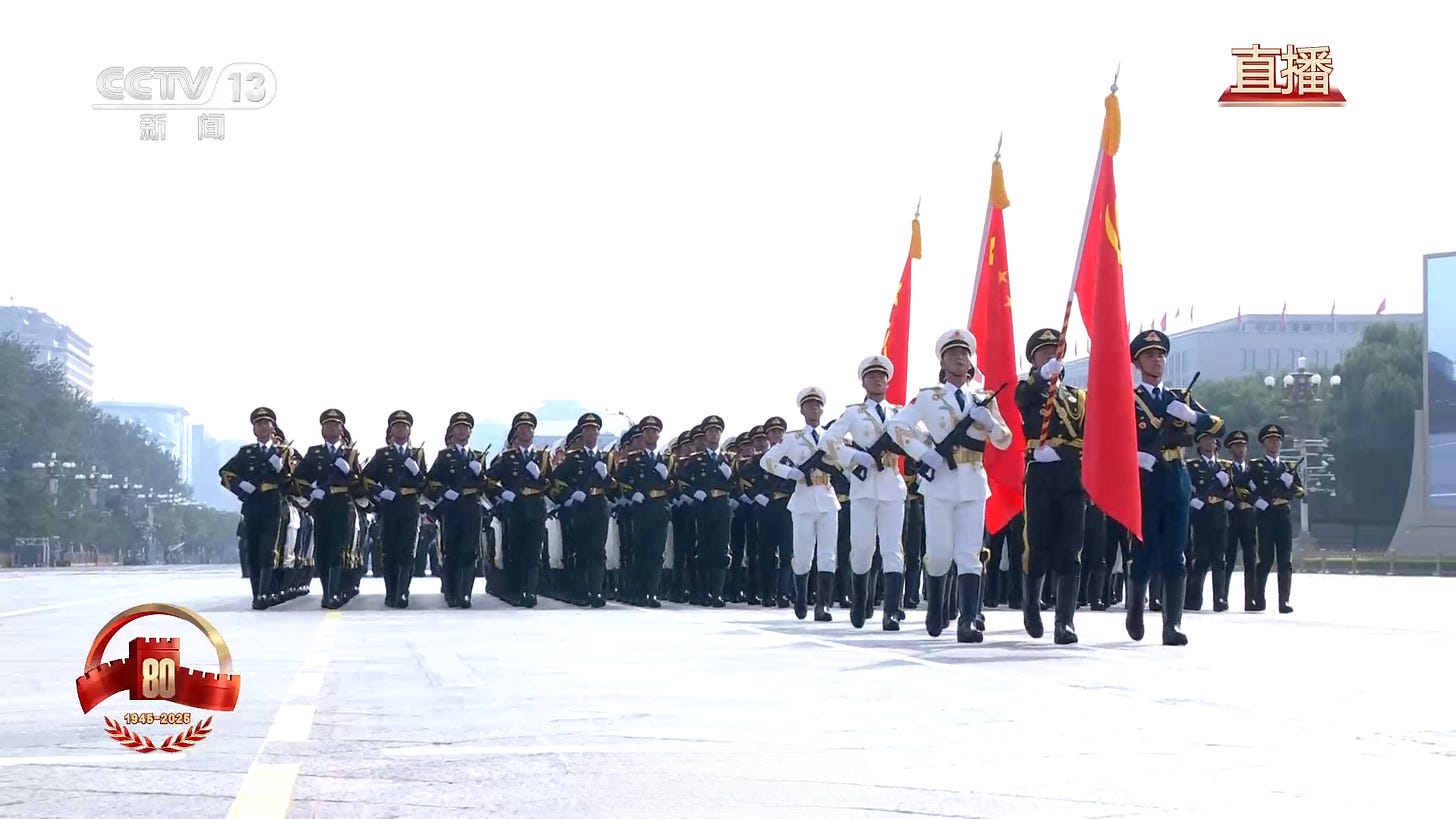 China’s People’s Liberation Army guard of honor leads the commemorative military parade carrying the flags of the People’s Republic of China, the Communist Party of China, and the People’s Liberation Army. China’s People’s Liberation Army guard of honor leads the commemorative military parade carrying the flags of the People’s Republic of China, the Communist Party of China, and the People’s Liberation Army.