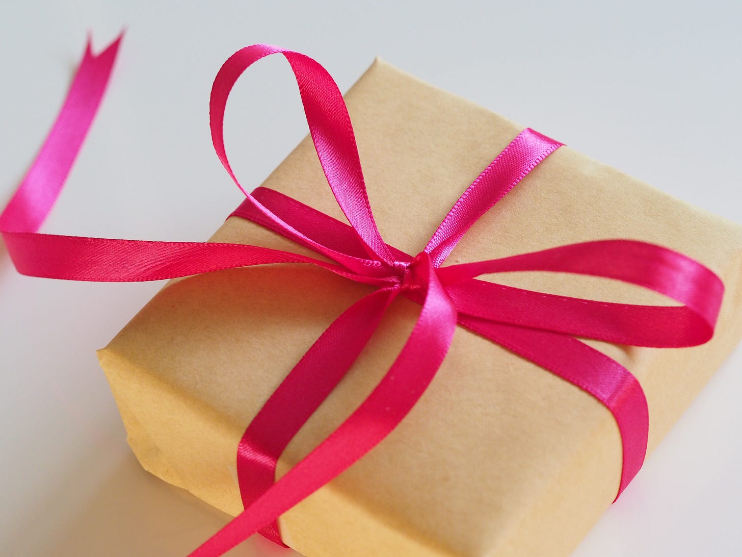 A gift wrapped with a bow