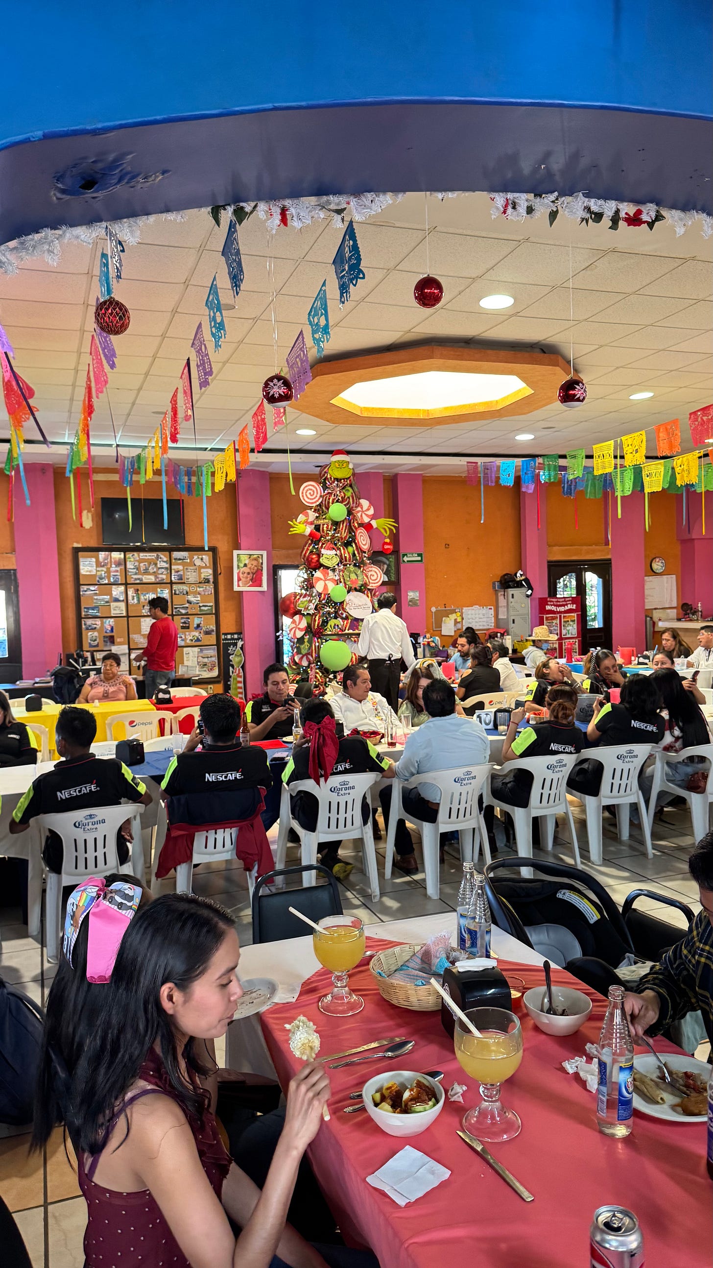 A busy Mexican restaurant at Christmas.