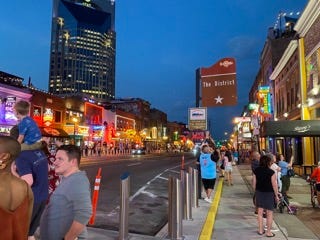 Various photos of Nashville’s tourist highlights, including its signature food “hot chicken,” Country Music HOF exhibits, and its replica of the Greek Parthenon.