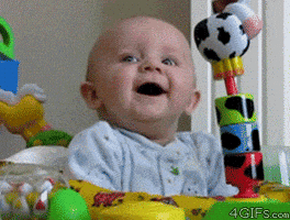 Video gif. A smiling baby jerks as if scared and its eyes grow wide as it stares in shock. Video gif. A smiling baby jerks as if scared and its eyes grow wide as it stares in shock.