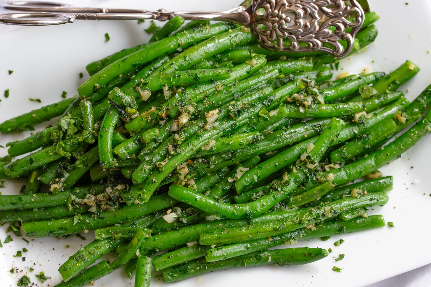 pan fried green beans on a serving plate