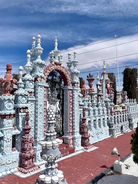 Images of a home in El Paso ornately decorated with blue and white flower carvings