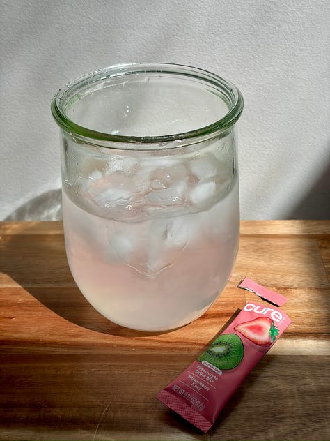 fresh strawberries; hydrating electrolytes water, fresh watermelon and cucumbers