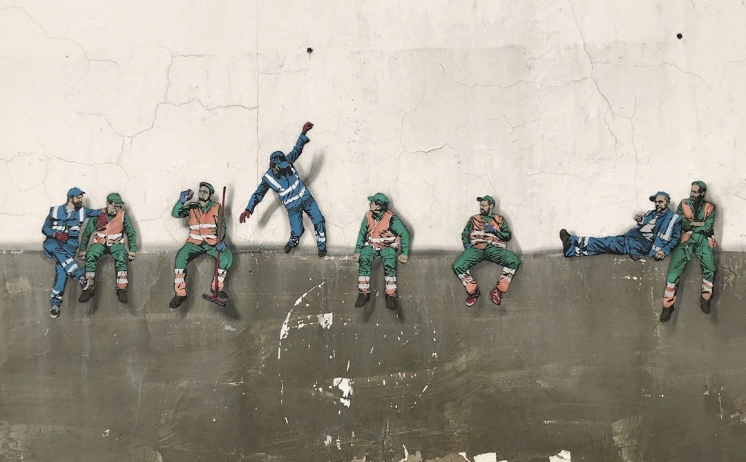 workers on wall painting