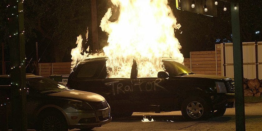 Walker police car firebombed with traitor written on side 1.16. Walker police car firebombed with traitor written on side 1.16.